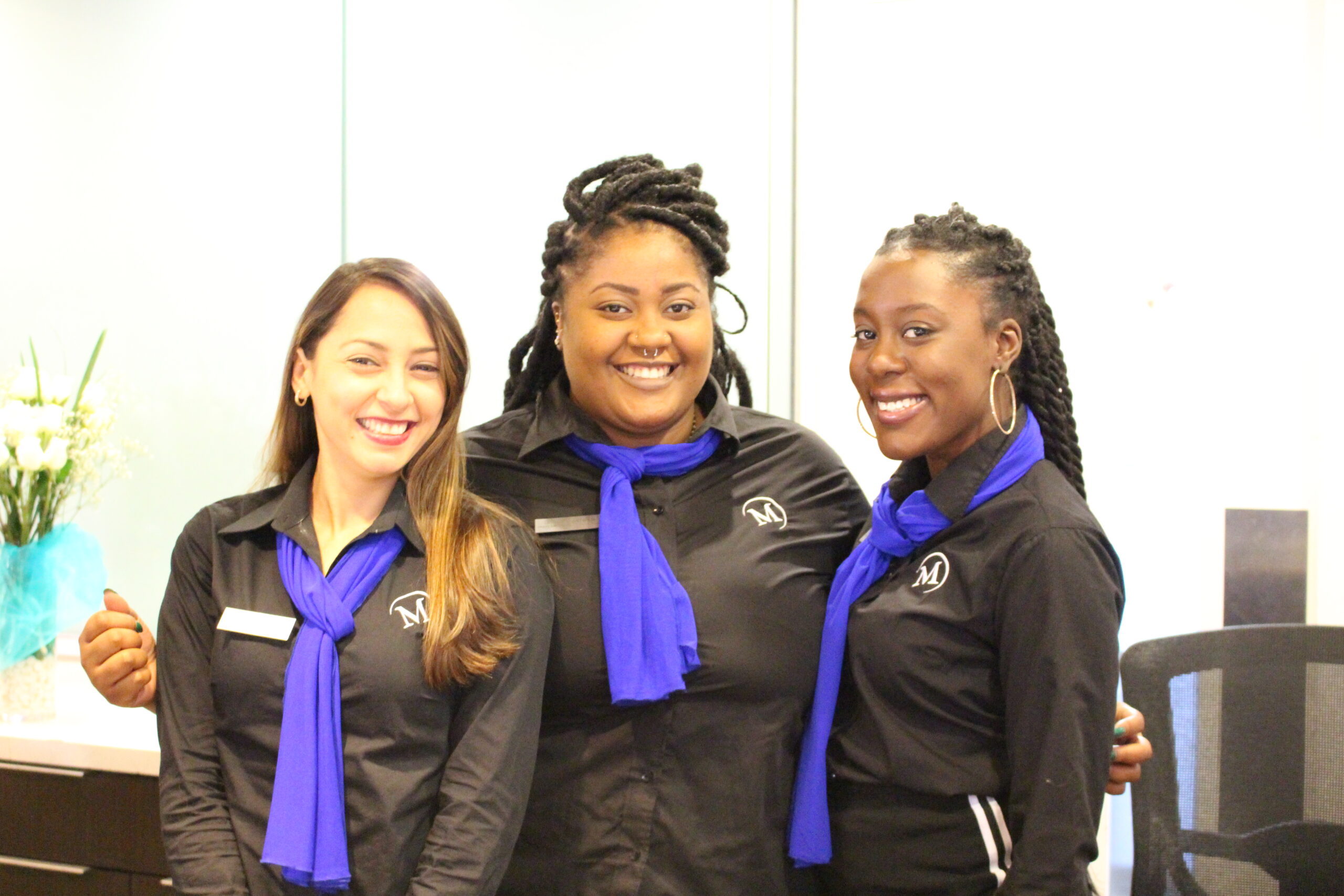 Photo of three West Front Desk staff