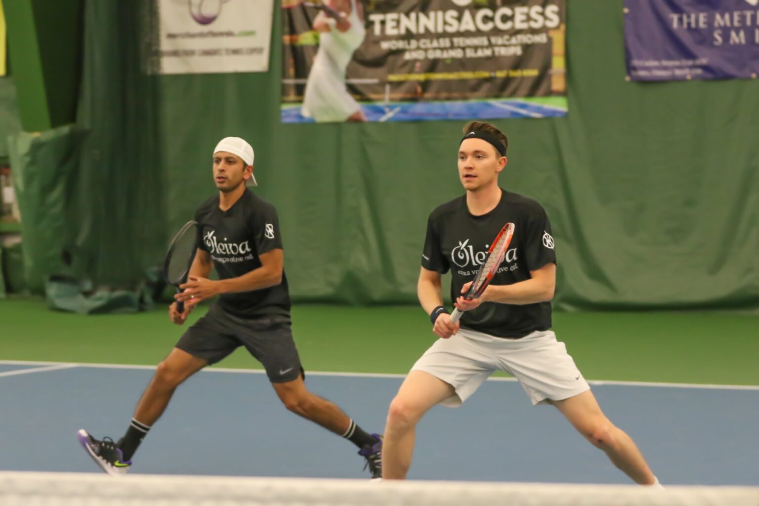 Sujit Das playing doubles tennis