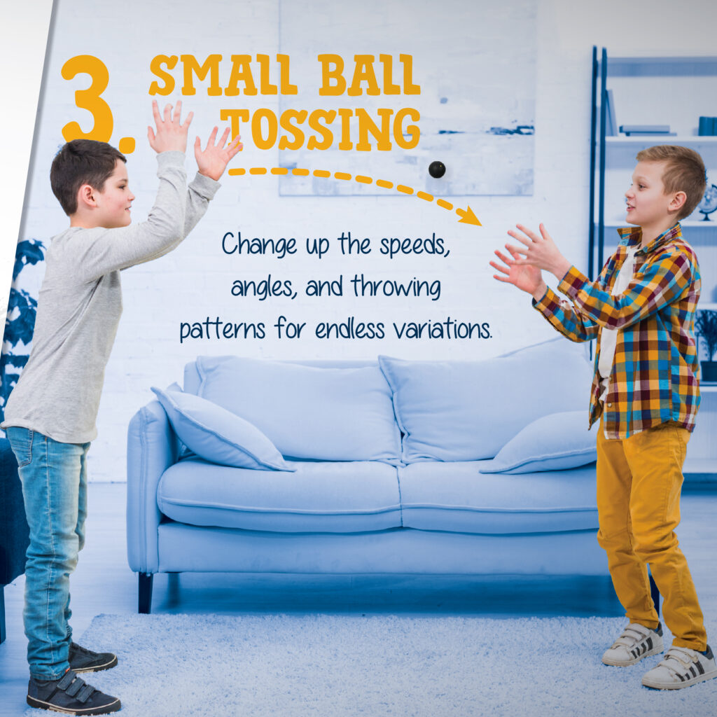 Image of two boys doing a small ball tossing drill