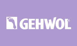 Purple button with the Gehwol brand logo on it. Gehwol is a brand of skin care products for feet.