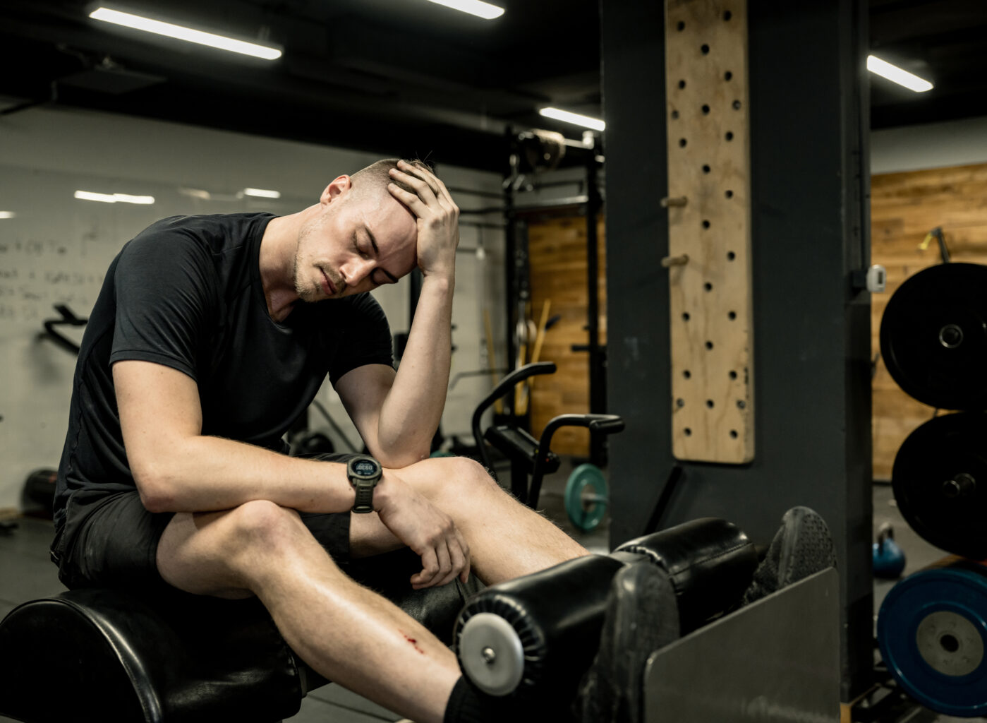 Man taking a break from exercising in the Gym. Source iStock by Getty Images.