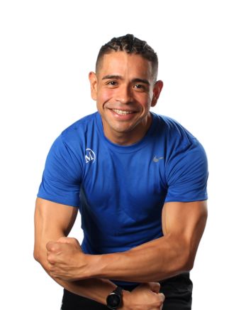 Headshot image of group fitness instructor Andrey in a pose that shows off his muscles.