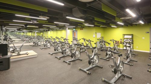 Another angle/image of the indoor cycling studio at Mayfair Parkway