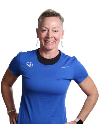 Head shot image of Tracy smiling at the camera. Tracy is a group exercise instructor.