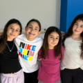 Image of a group of girls at a Sports Camp. They are in the Group Exercise Studio at Mayfair West.