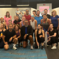 Group of fitness class participants in the gym.